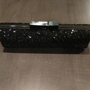 LOOKING FOR: BEBE SEQUIN BLACK CLUTCH